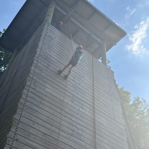 students doing an outdoor obstacle course